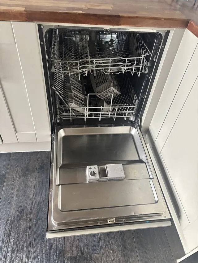 Cleaned integrated dishwasher and kitchen units, Lewisham flat